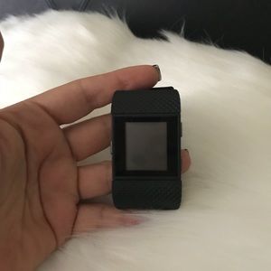 EUC Fitbit Surge, charger included.